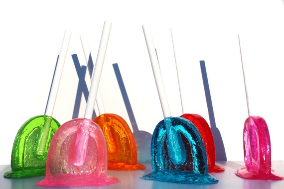 Giant oversized suckers lollypops tootsie pops melting resin sculpture 14" tall, pick your color find out more.