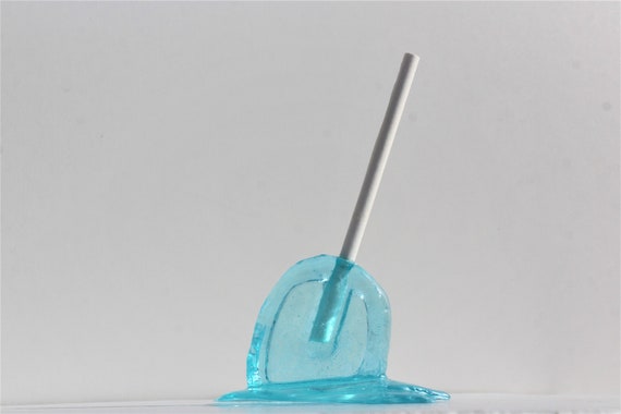 Sucker bright blue resin melting candy sculpture find out more.