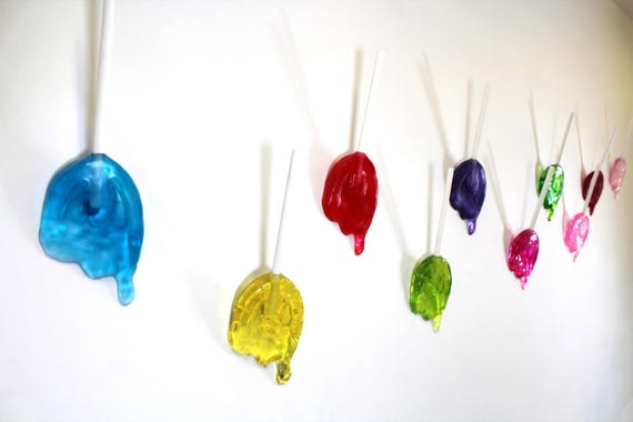 Wall hanging resin candy 11 inch long melting sucker sculptures, pick your color, find out more.