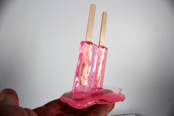 Resin twin popsicle double stick melting sucker sculptures hot pink find out more.