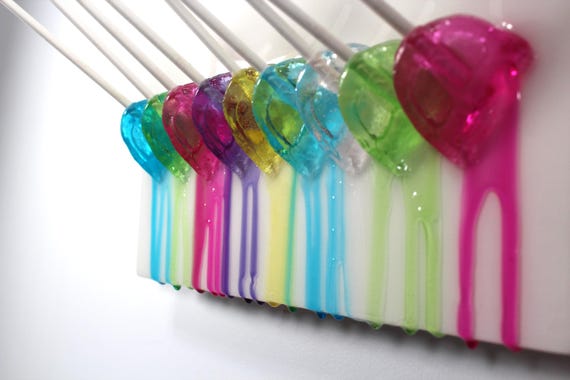 Colorful fractal resin sucker melting down the wall 3D art.  Colorful fun wall art.