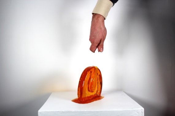 Giant oversized sucker melting resin sculpture citric orange find out more.