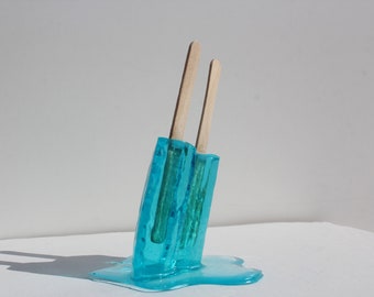 Resin twin popsicle double stick melting sucker sculptures, bright blue, find out more.