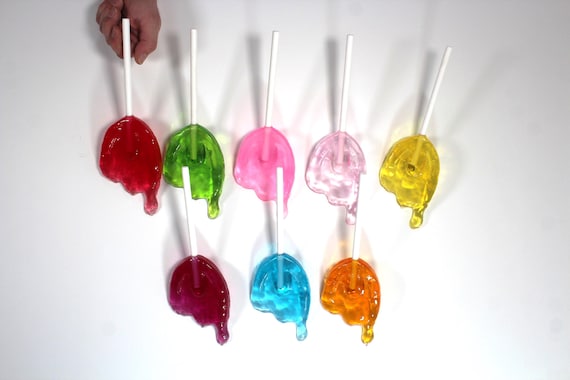 Wall hanging resin candy melting sucker sculptures 11 inches long, pick your color, find out more.