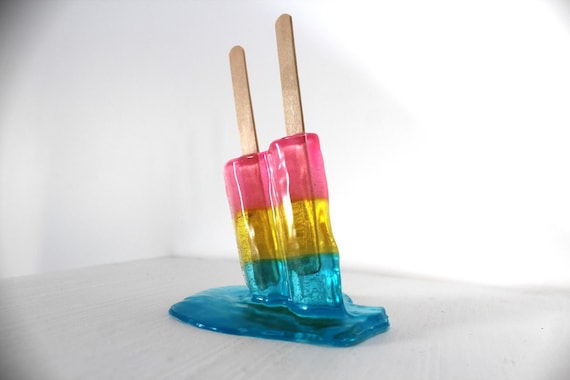 Resin twin popsicle double stick melting colorful sucker sculptures, find out more.