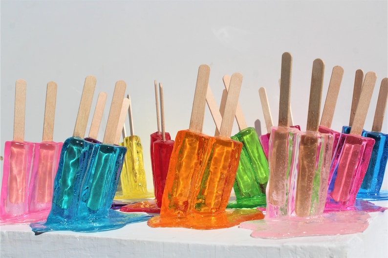 Resin twin popsicle double stick melting sucker sculptures, pick your color, find out more. image 1