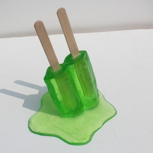 Resin twin popsicle double stick melting sucker sculptures, lime green, find out more.