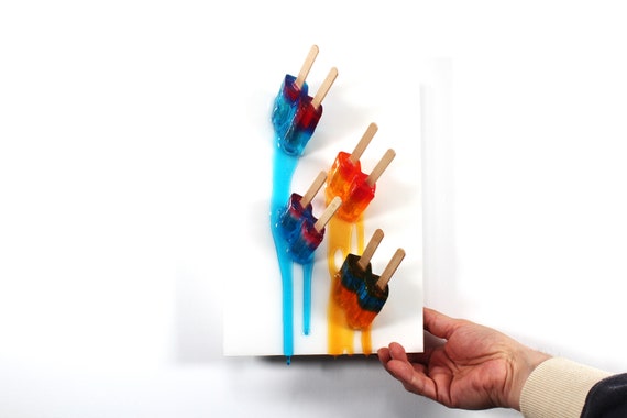 Fractal resin popsicles melting down the wall 3D art.  Colorful fun wall art.