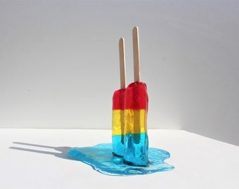 Resin twin popsicle double stick melting sucker sculptures primary colors, find out more.