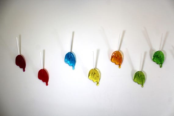 Wall hanging resin candy melting sucker sculptures 11 inches long, pick your color, find out more.