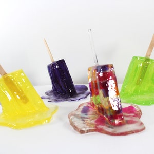 4 Resin popsicle sucker sculptures 1 gummi colored find out more. image 1