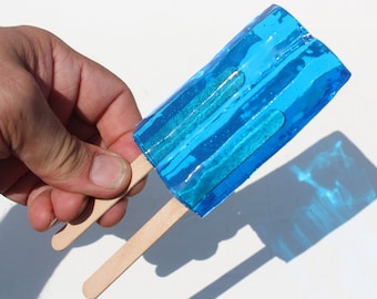 Resin twin popsicle double stick bright blue sucker sculpture find out more.