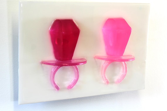 Giant oversized ring pop resin sculpture hot pink 3D wall art find out more.