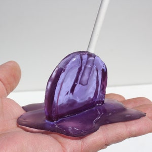 Melting resin sucker grape purple candy sculpture find out more.