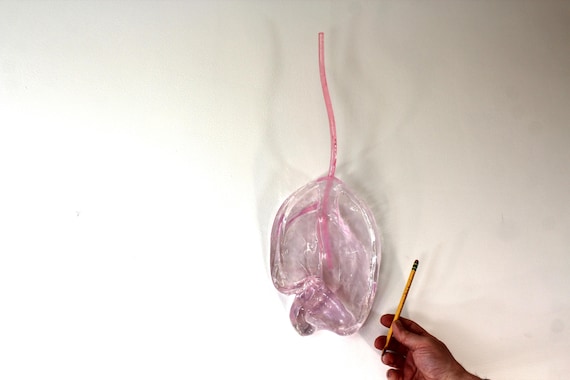 Resin sucker melting down the wall art sculpture 21 inches tall find out more.