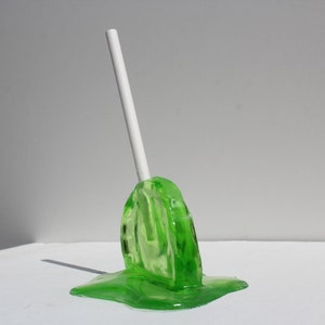 Melting resin sucker lime green candy sculpture find out more.