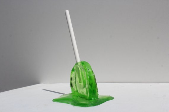 Melting resin sucker lime green candy sculpture find out more.