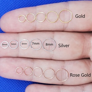 Boucles d'oreilles et anneaux de nez très légers. Créoles fantômes très fines. Epaisseur 0,55 mm (calibre 23) - Diamètre intérieur 4 mm, 5 mm, 6 mm, 7 mm, 8 mm, 9 mm