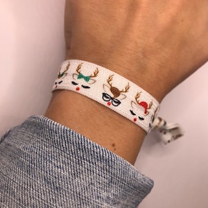 Weihnachtliches Armband mit Rentier / Schneeflocke (elastisches Hairtie)