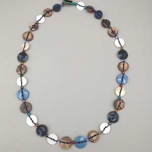 Handmade multi-colored beaded necklace with plastic and shell buttons