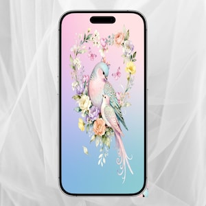 May include: A smartphone displays a watercolor illustration of two birds surrounded by a floral heart. The birds are in shades of pink, blue, and white, with long tail feathers. The background transitions from pink to blue.