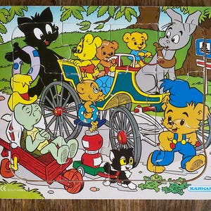 Houten puzzel met het Zweedse stripfiguur Bamse en zijn vrienden