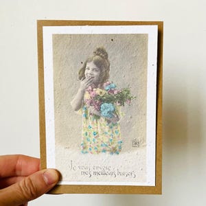 Tarjeta vintage plantable con los mejores besos