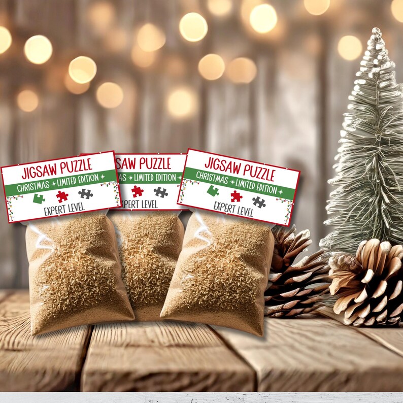 May include: Three small bags filled with brown jigsaw puzzle pieces, each with a red and green Christmas-themed label that reads "Jigsaw Puzzle Christmas + Limited Edition + Expert Level".