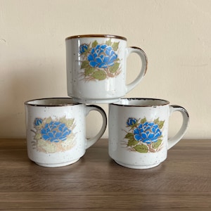 Vintage set of three chrysanthemum Japanese stoneware mugs