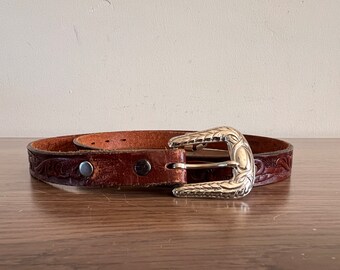 Vintage women’s belt hand tooled 32.5" filagree pattern silver colored buckle, womens thin south western cowgirl belt, brown leather