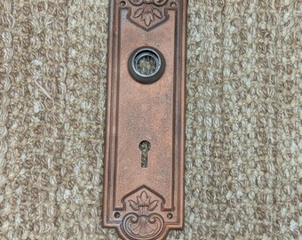 2 1/4" x 7 7/16" antieke gestempelde stalen deurknop met koperen afwerking