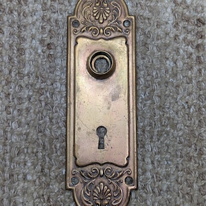 2 3/8&quot; x 7 5/8&quot; Antique Lockwood &quot;Westfield&quot; Brass Door Knob Plate Circa 1897
