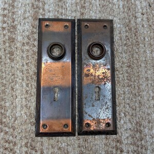 Pair 2 1/4" x 7" Antique Japanned Stamped Steel Door Knob Plates
