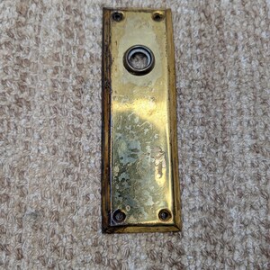Deurknopplaat van antiek gestempeld messing, 2 1/4" x 7".