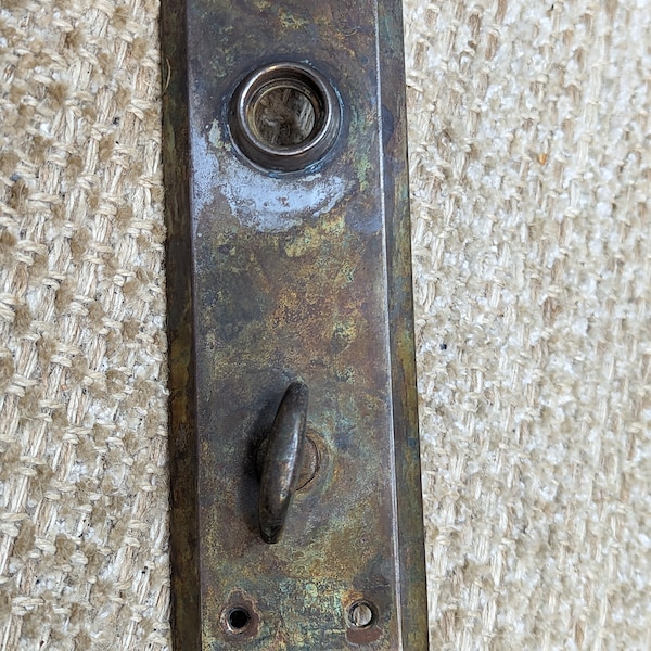 2 1/4" x 7" Antique Stamped Steel Thumb Turn Door Knob Plate