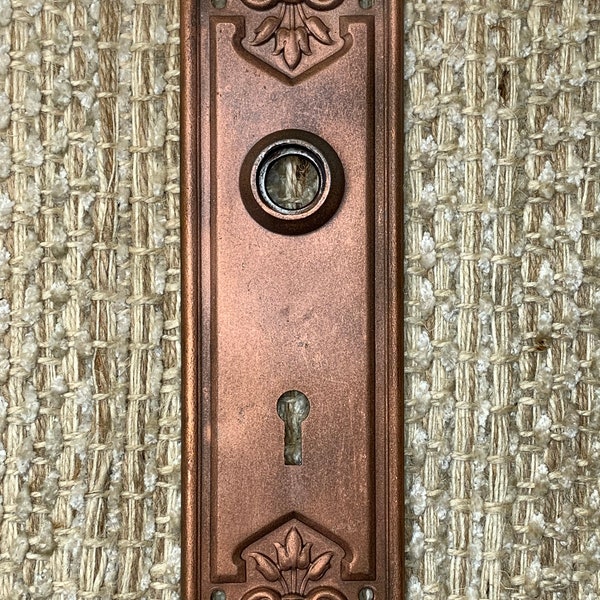 2 1/4" x 7 7/16" Antique Stamped Steel Door Knob Plate-Copper Finish