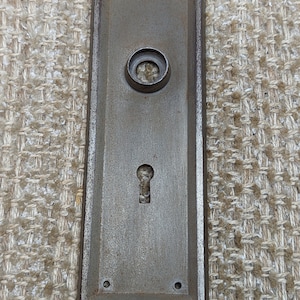 2 7/16" x 7 1/8" Antique Stamped Steel Door Knob Plate