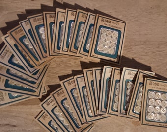 12 Small mother of pearl buttons, 10 mm and 11 mm sewn on card, 1940&#39;s. 12 vintage small mother of pearl buttons,