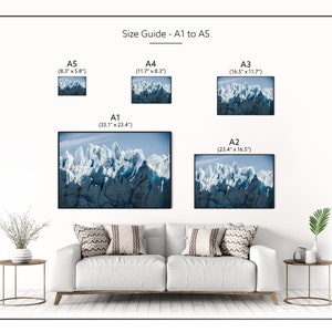 May include: A size guide for prints, showing the different sizes from A5 to A1. The image shows a photo of a glacier with a blue sky in the background. The sizes are listed in inches.