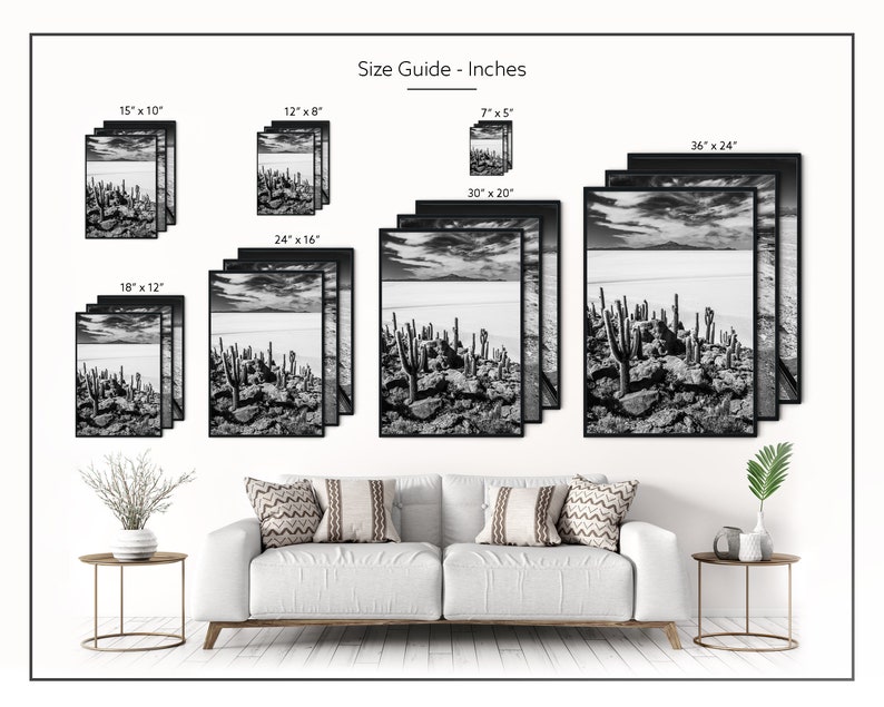 May include: Black and white framed art prints in various sizes, including 15" x 10", 12" x 8", and 7" x 5". The prints depict a desert landscape with cacti. The phrase "Size Guide - Inches" is displayed above the prints.