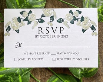 Gedrukte RSVP-kaart en envelop