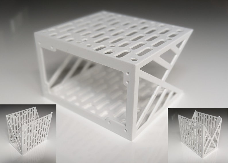May include: White, geometric, open-frame storage organizer with a grid pattern. The organizer is made of plastic and has a modern design.