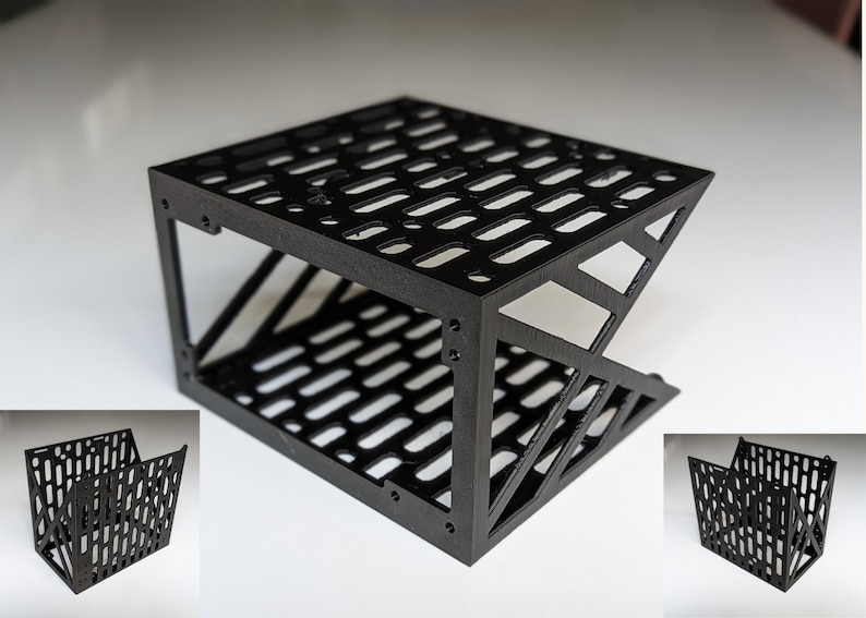 May include: A black, geometric, open-frame storage shelf with a grid pattern. The shelf is made of plastic and has a modern design.