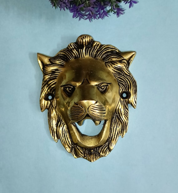 吠えるライオンの顔の形をした壁飾りアイテム | 真鍮製のショーピース