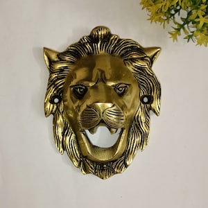 Oggetto decorativo da parete a forma di faccia di leone ruggente / Decorazione da parete a tema festa in ottone