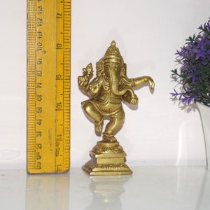 Dancing Ganesha Home Décor Statue |  Jumping Vinayaka With Lotus Flower | Weight: 275 Grams Approx.