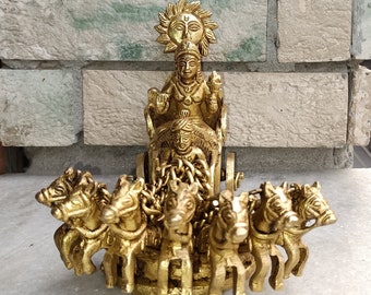 Lord Surya On His Seven Horses Chariot Brass Showpiece | God Surya Dev Rath Window Statue Ritual Table Decoration | Weight- 1.880 KG Approx.