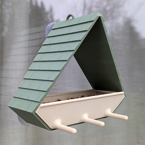 Mangeoire à oiseaux pour fenêtre en forme triangulaire de sapin minimaliste fixation à ventouses bicolore vert olive décoration de jardin