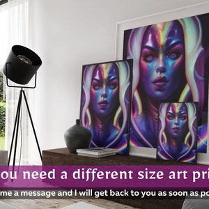 May include: Three framed art prints featuring a woman with iridescent skin and a galaxy background. The prints are in different sizes and are displayed on a shelf.