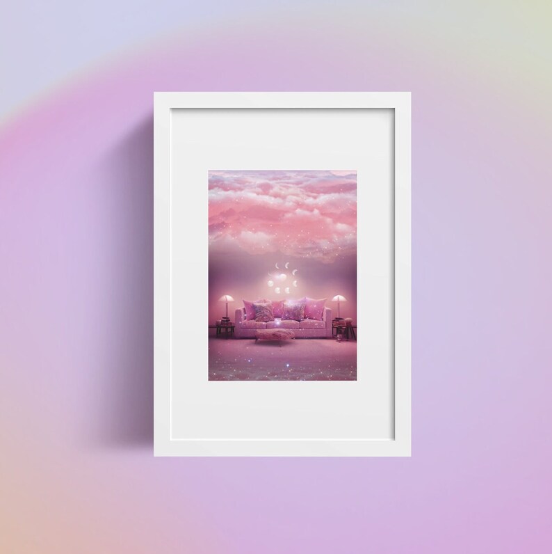 May include: A white framed print of a pink living room with a couch and a cloud ceiling. The couch has pink pillows and a white throw blanket. The cloud ceiling has a crescent moon and stars.